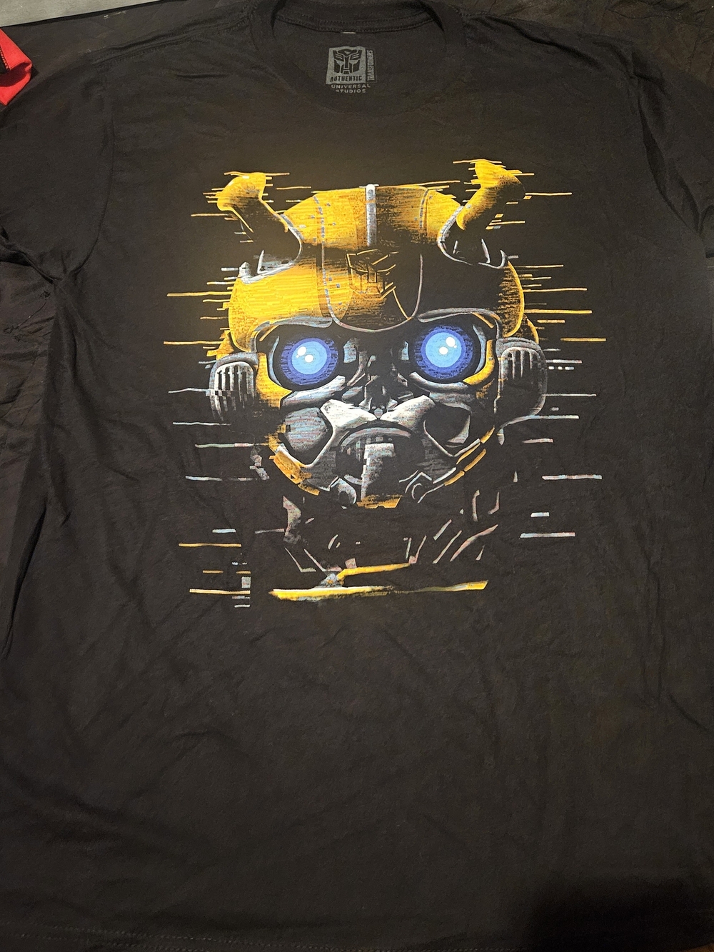 Universal Women's Black Tee with Yellow and Blue Robot Graphic